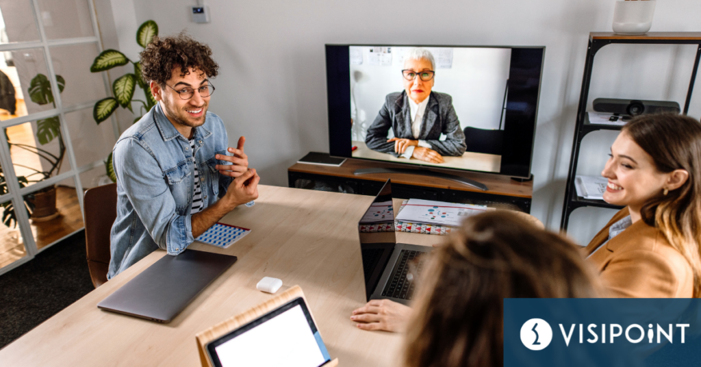 Corporate meeting with one staff member working remotely