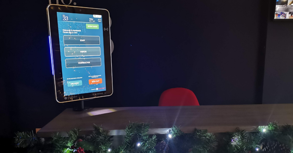 VisiPoint solution at reception desk decorated for Christmas